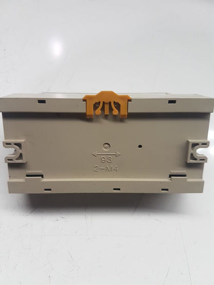 Omron SRT2-ID16-1 PLC Module with Orange Clip, 93 and 2-M4 markings, beige industrial automation component.