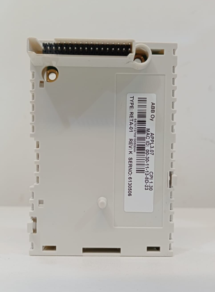 ABB RETA-01 Ethernet Adapter, white plastic enclosure, product label visible: MAC ID, SERNO. PLC automation part.
