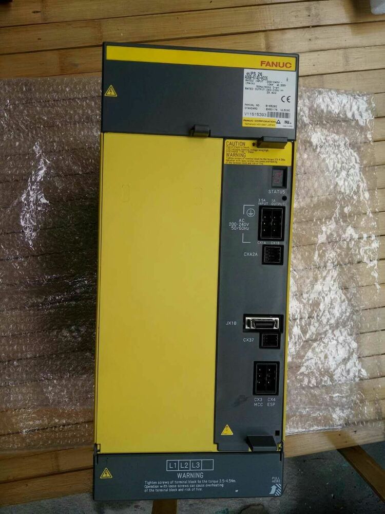 FANUC A06B-6140-H026 Servo Drive. Industrial automation part with labels, warnings.  New servo drive for sale.