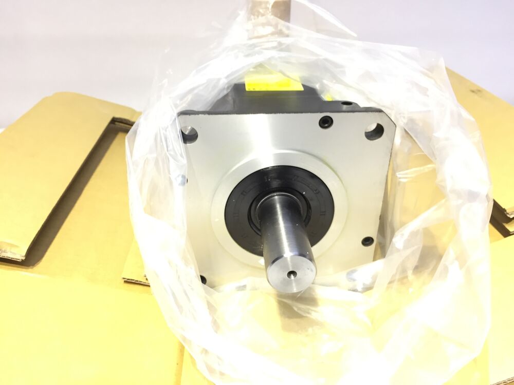 FANUC A06B-0243-B101 Servo Motor, new industrial automation part in protective packaging.