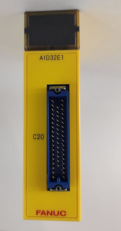 FANUC A03B-0807-C105 I/O Interface Module AID32E1, yellow PLC module with blue connector.