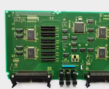 FANUC A16B-2203-0881 PCB Board. Green circuit board with electronic components, viewed from above.