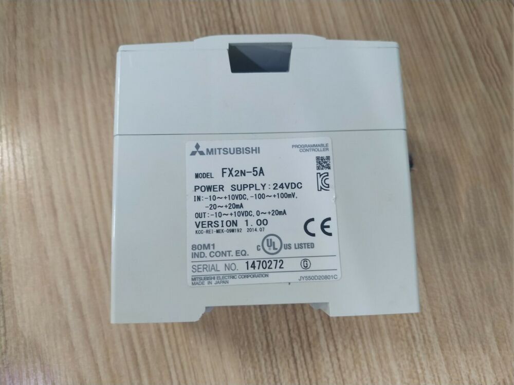 Mitsubishi FX2N-5A PLC Module with labels: Programmable Controller, 24VDC power supply, Made in Japan.