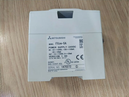 Mitsubishi FX2N-5A PLC Module with labels: Programmable Controller, 24VDC power supply, Made in Japan.