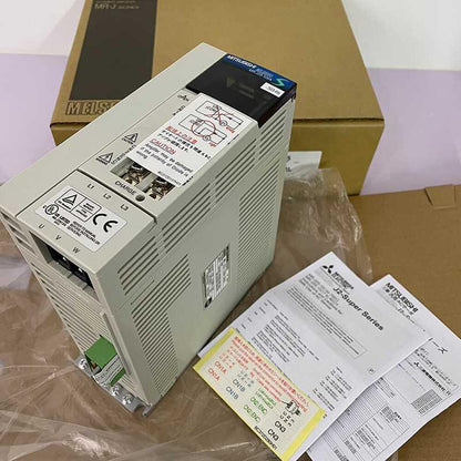 Mitsubishi MR-J2S-100A-S046 Servo Drive in box, product shot from a high angle.