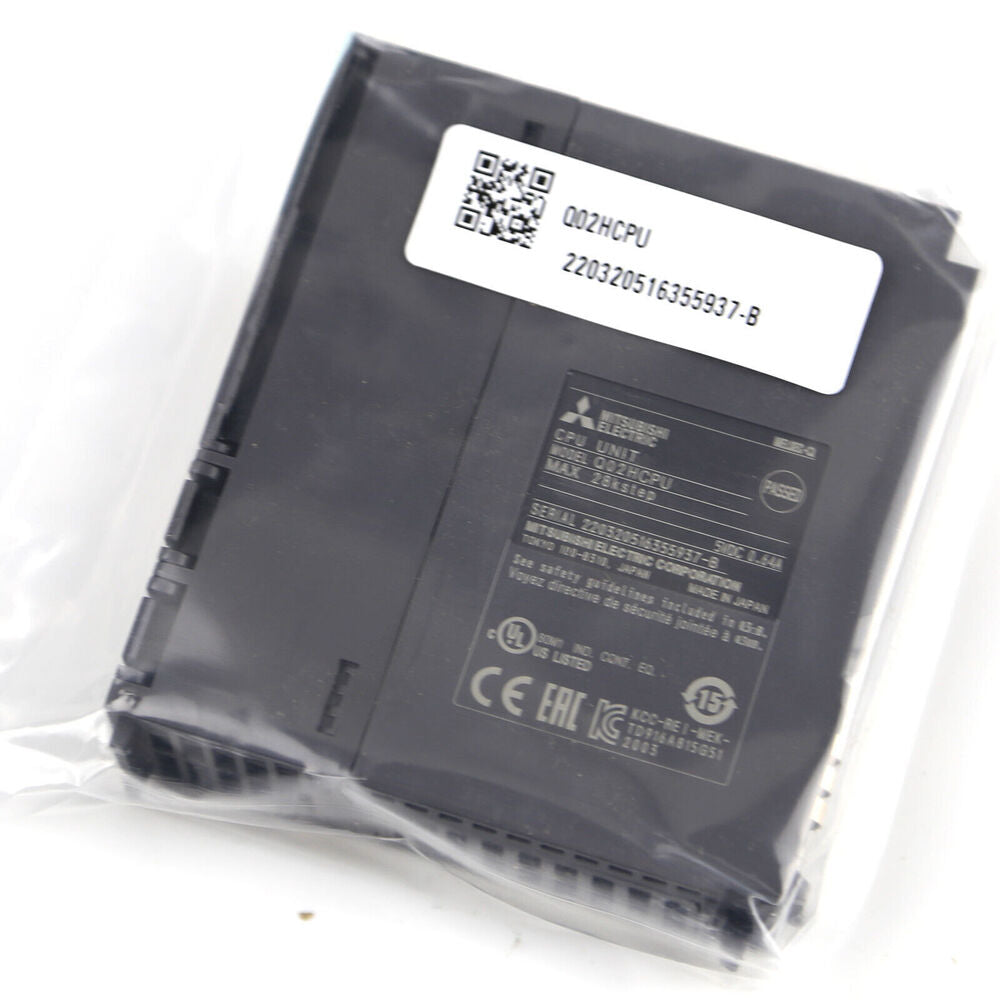 Mitsubishi Q02HCPU PLC Module in packaging, featuring product details and specifications. Industrial automation part.