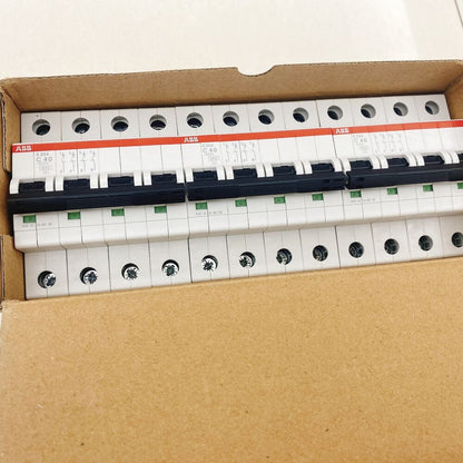 ABB S204 C40 circuit breakers in box, white and black components for PLC systems.