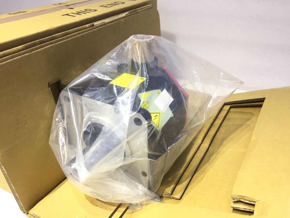 FANUC A06B-0243-B101 Servo Motor in original packaging, automation spare part.