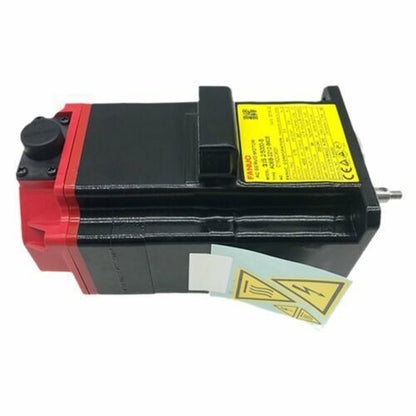 FANUC A06B-2212-B605 Servo Motor, black and red casing with warning labels, industrial automation part.