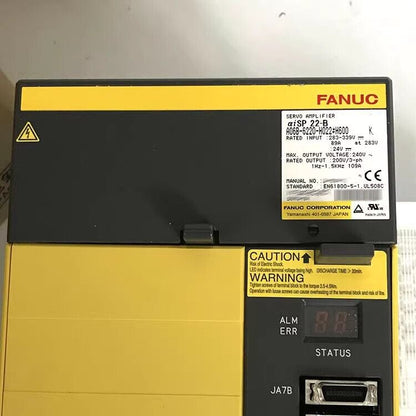 FANUC Servo Amplifier A06B-6220-H022#H600. New servo drive with caution and warning labels.