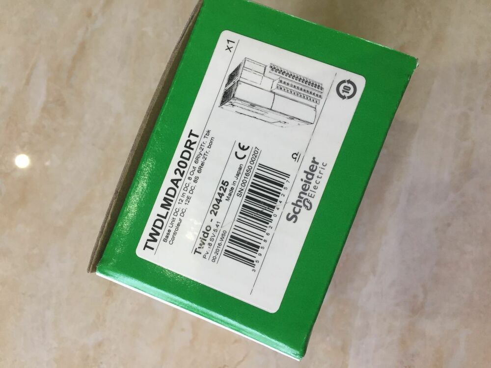 Schneider Electric TWDLMDA20DRT PLC Module in green packaging, new in box.