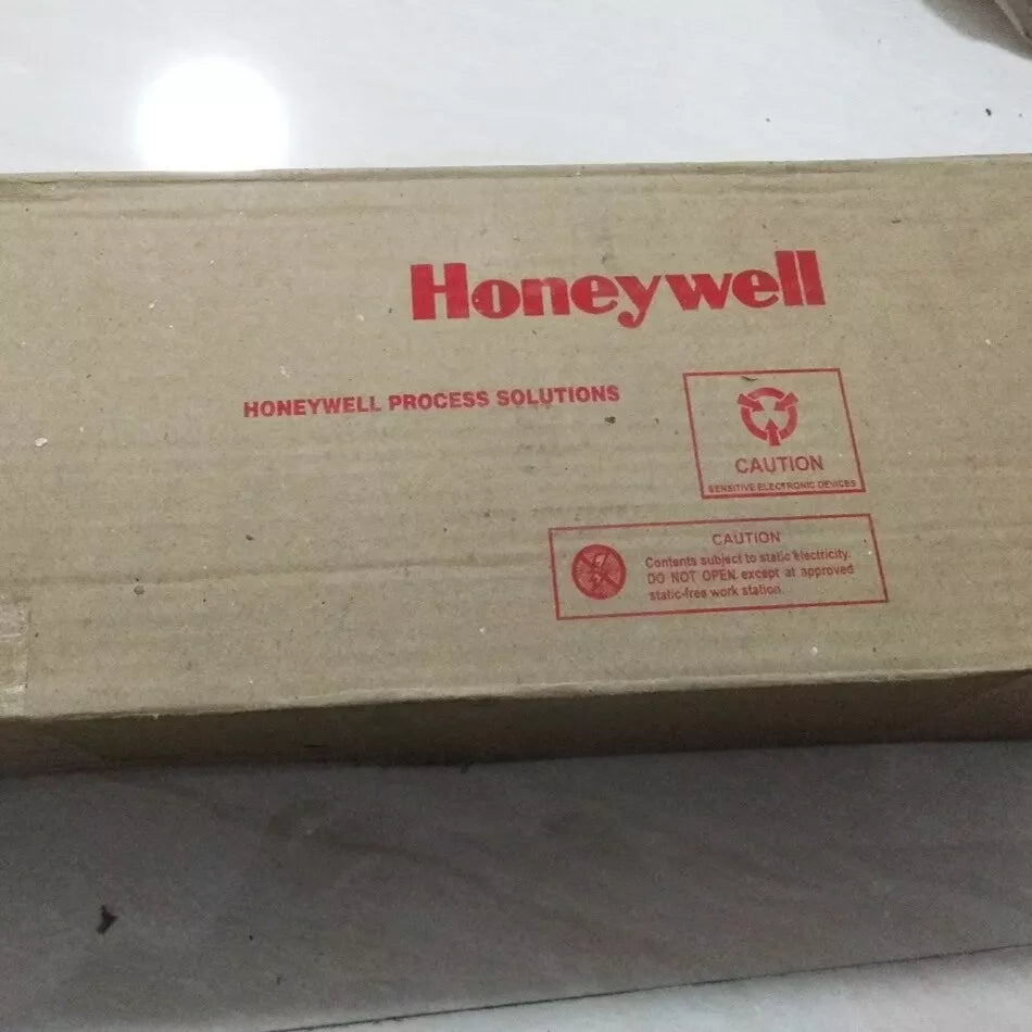 Honeywell product packaging box, industrial automation parts, caution sensitive electronic devices.