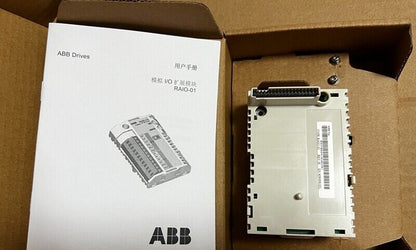 ABB RAIO-01 Analog I/O EXTENS module with manual in box. Industrial automation part.
