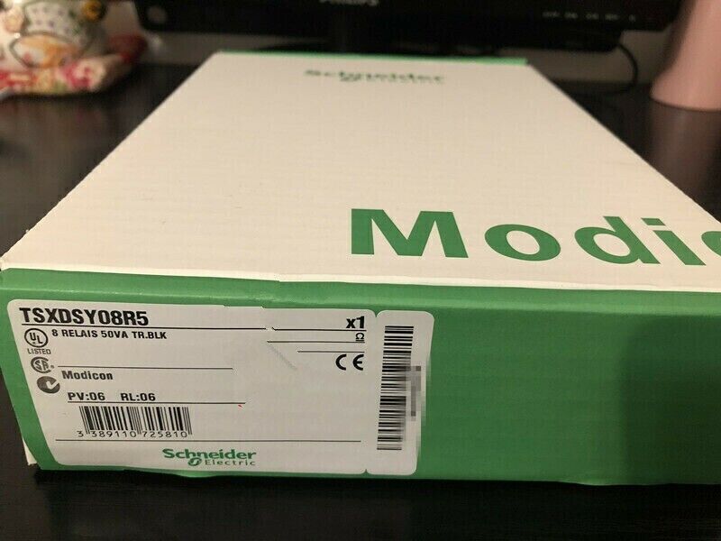 Schneider Electric TSXDSY08R5 output module box, industrial automation part, green and white packaging