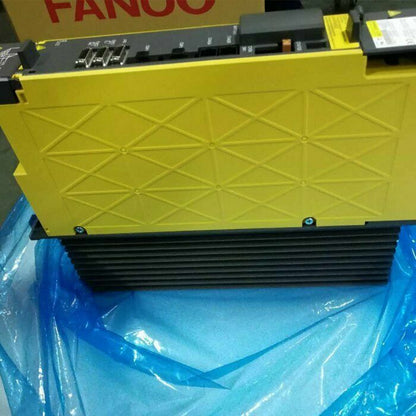 FANUC A06B-6290-H204 Servo Driver, yellow industrial automation component.