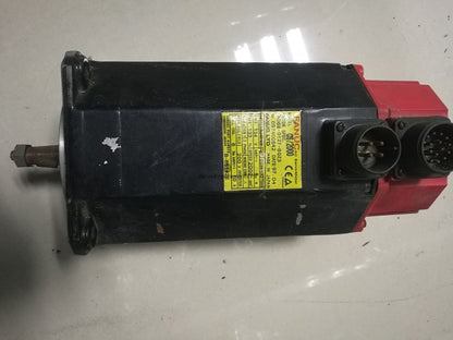 FANUC A06B-0127-B075 Servo Motor with yellow specification label, industrial automation part