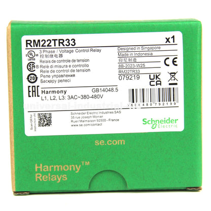 Schneider RM22TR33 Voltage Control Relay Box. Green packaging with product details, Harmony Relays.