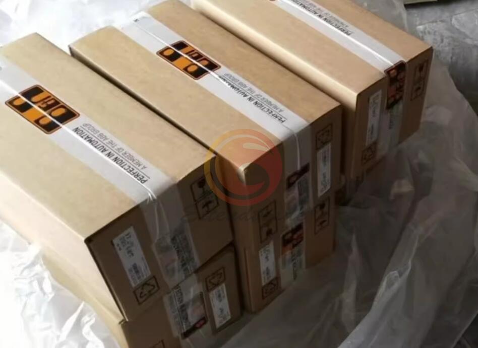 Stacked cardboard boxes of B&R servo drivers, ABB Group member, for industrial automation.