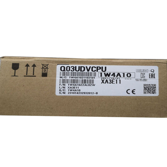 Mitsubishi Q03UDVCPU PLC Module, product label details, including model number, serial number, and date codes.