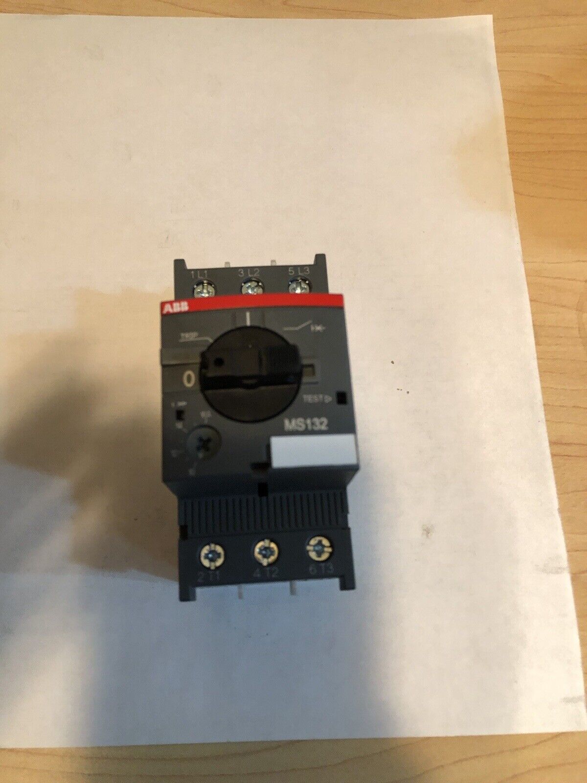 ABB MS132 motor protective circuit breaker, black and gray. Industrial automation equipment. Features MS132 label.