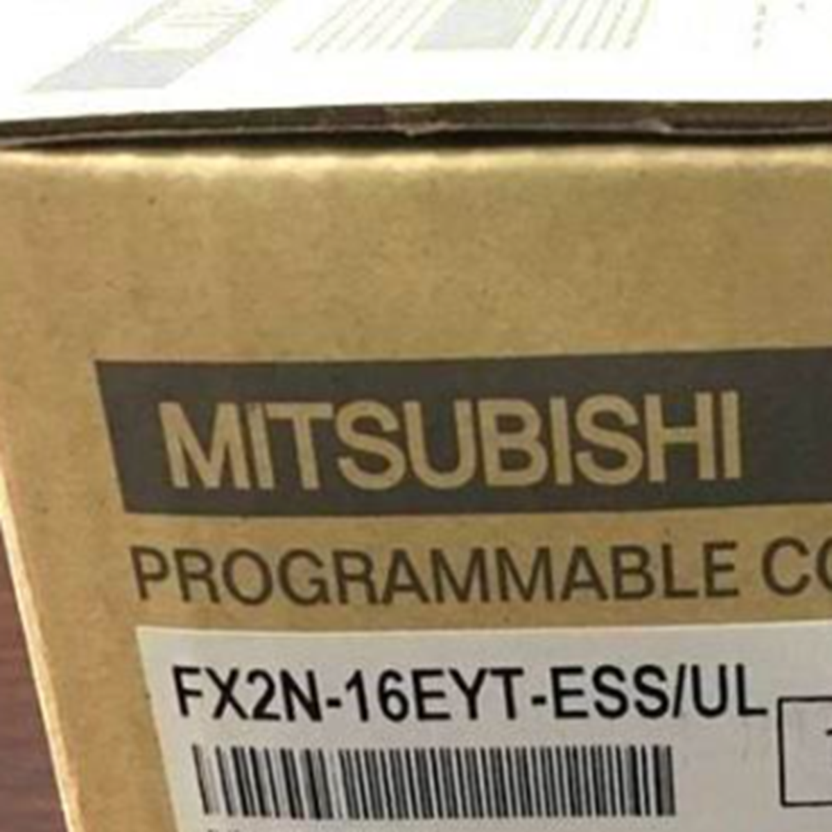 Mitsubishi FX2N-16EYT-ESS/UL Programmable Controller, angled shot of the product packaging.