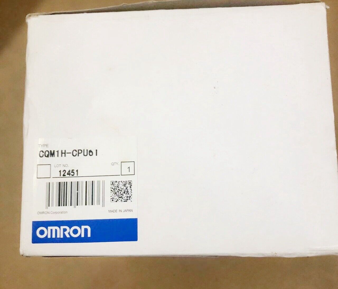 OMRON CQM1H-CPU61 PLC module, white box with product label and logo.
