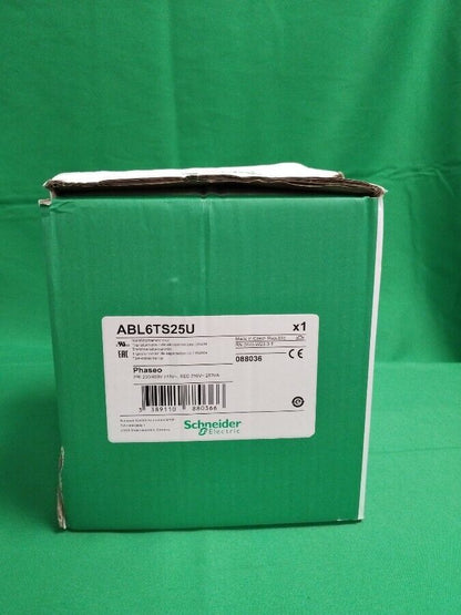 Schneider Electric ABL6TS25U industrial power supply unit in green packaging.