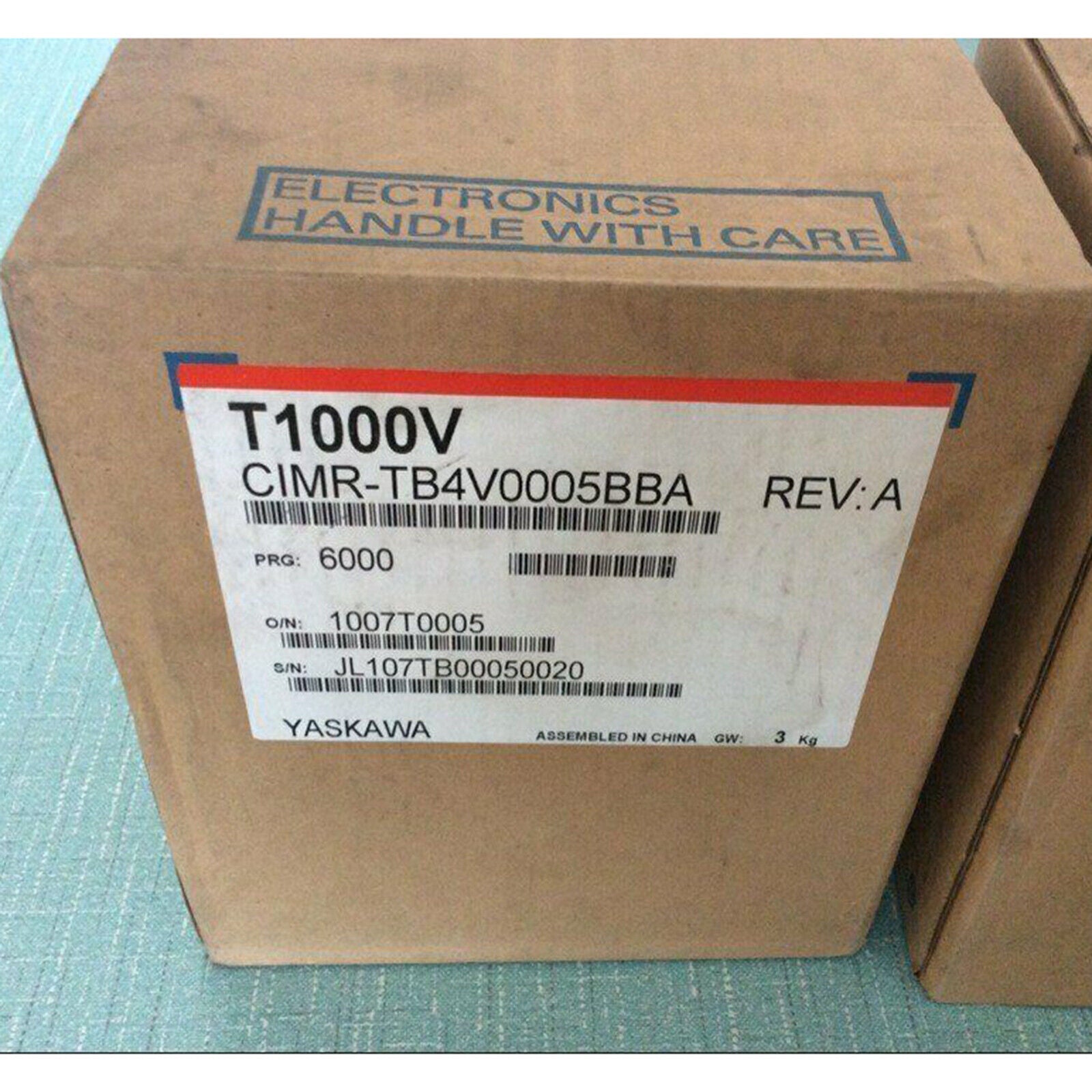 Yaskawa T1000V CIMR-TB4V0005BBA Inverter in box, electronics handle with care.