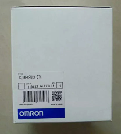 Omron CJ1M-CPU13-ETN PLC Module in box, white packaging with product label and barcode.