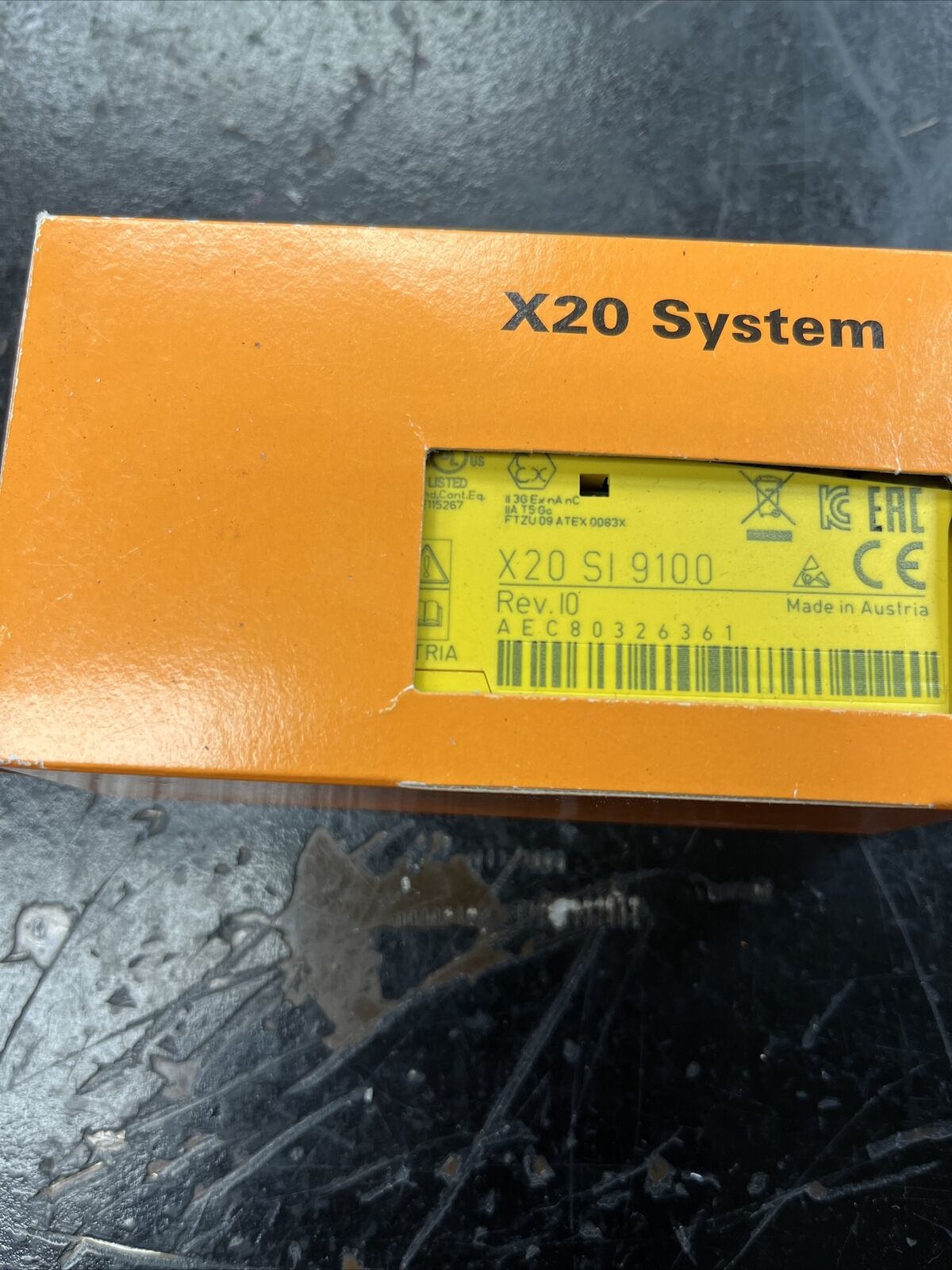 B&R X20 SI 9100 I/O Module. Orange box with X20 System text and product information, Rev. 10, Made in Austria