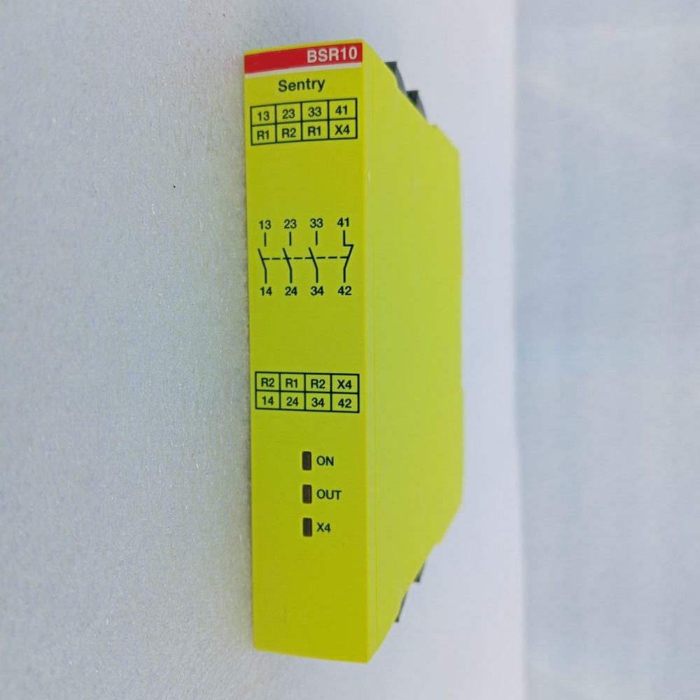 ABB BSR10 safety relay, yellow housing, terminal details including 13, 23, 33, 41, 14, 24, 34, 42 markings, PLC component.