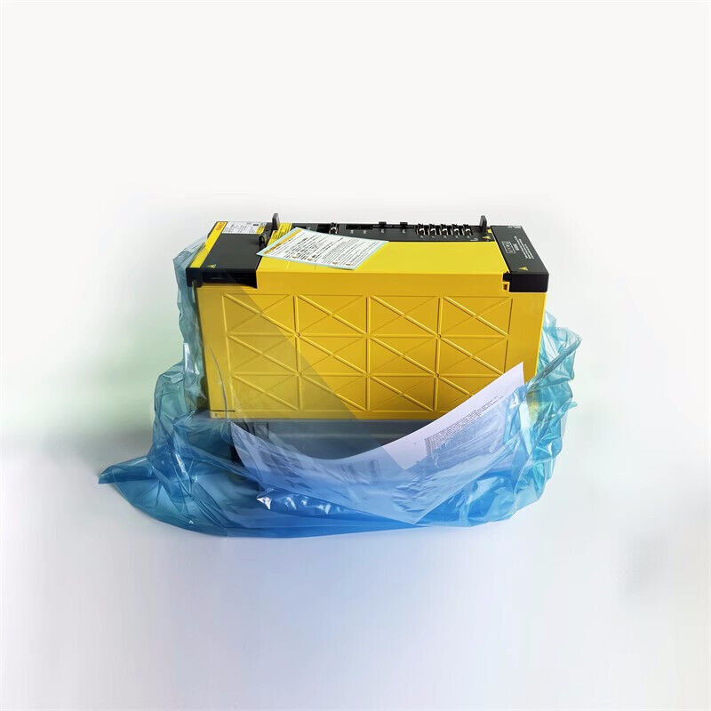 FANUC A06B-6222-H030#H610 servo amplifier in yellow packaging with documentation, industrial automation part