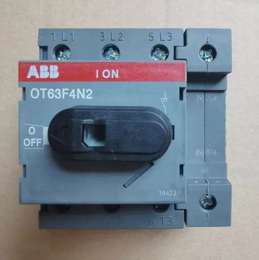 ABB OT63F4N2 switch disconnector, gray and red, with ON/OFF switch.