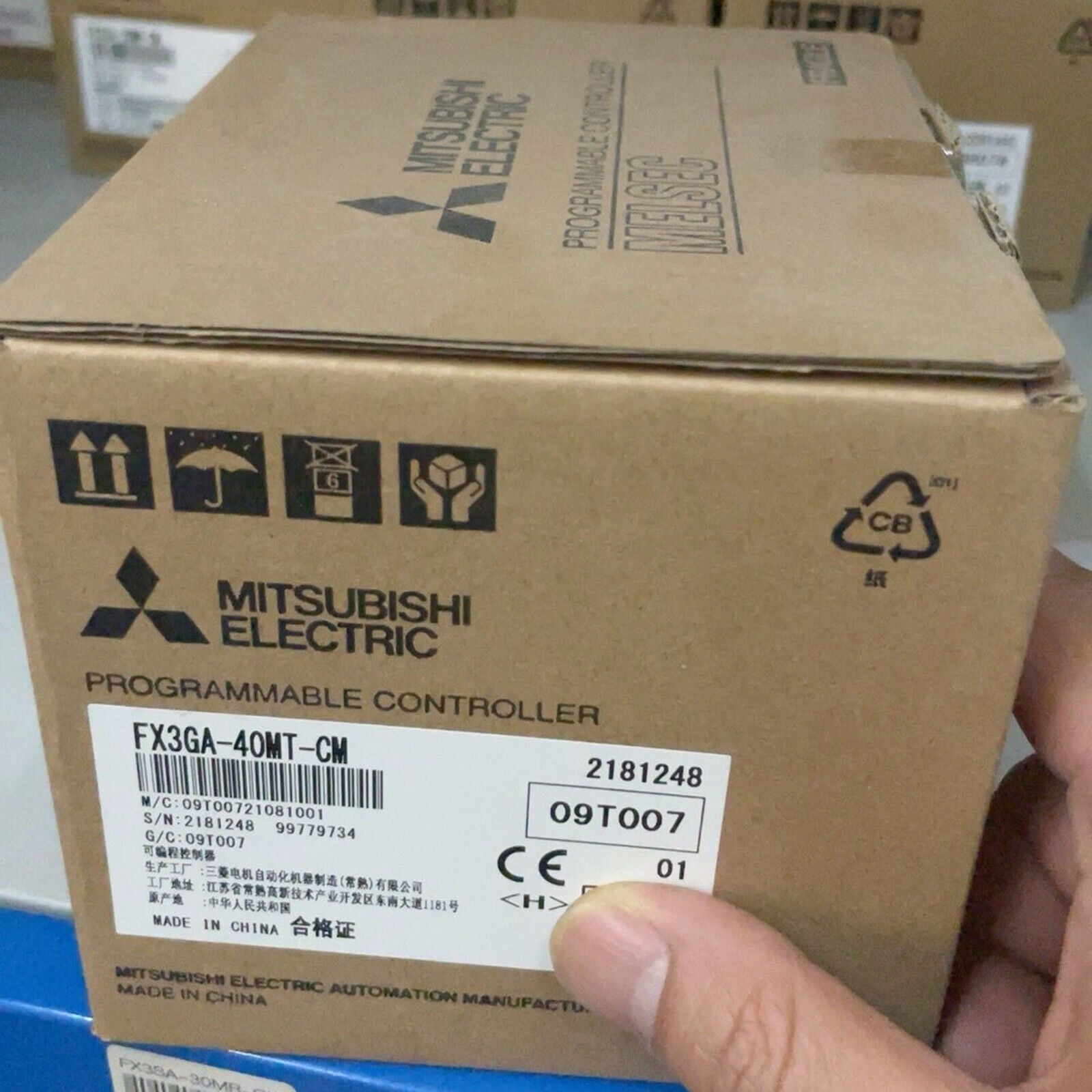 Mitsubishi FX3GA-40MT-CM PLC Module in box. New, industrial automation part.