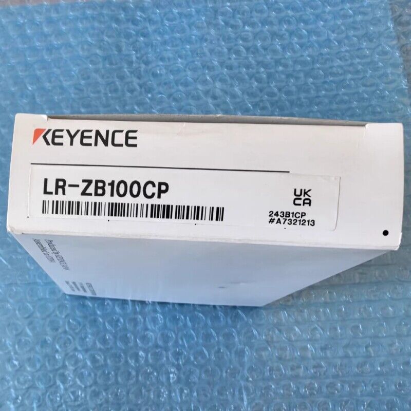 KEYENCE LR-ZB100CP laser sensor box, new industrial automation part, UK CA marking, barcode label.