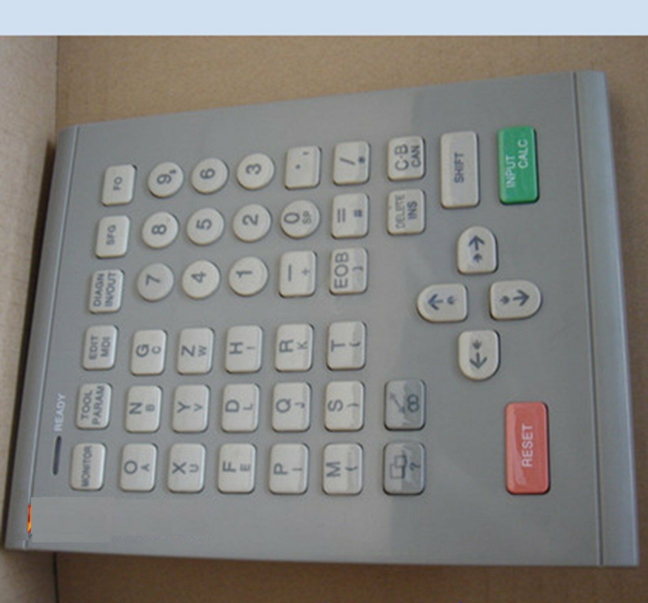 Mitsubishi compatible keypad KS-4MB911A/914A/915A, gray body, white keys, for industrial automation.