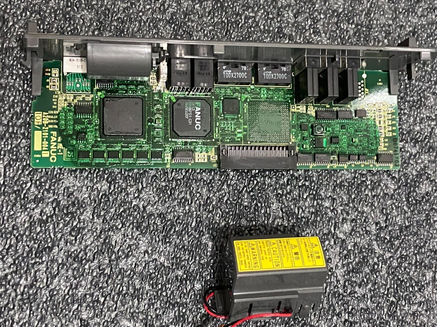 FANUC A20B-2101-0041 servo motor drive control board, industrial automation part with caution warning label