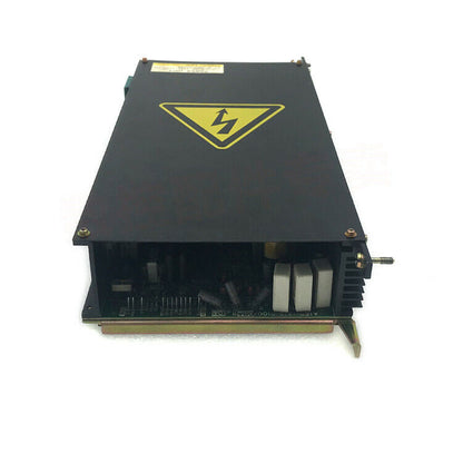 FANUC POWER UNIT A16B-1212-0100-01. Black enclosure, warning sign. Industrial automation PCB.