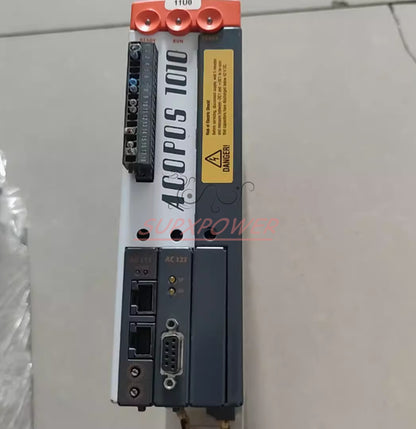 B&R ACOPOS 1010 Servo Drive, detailed view with ports and warning labels, side angle shot