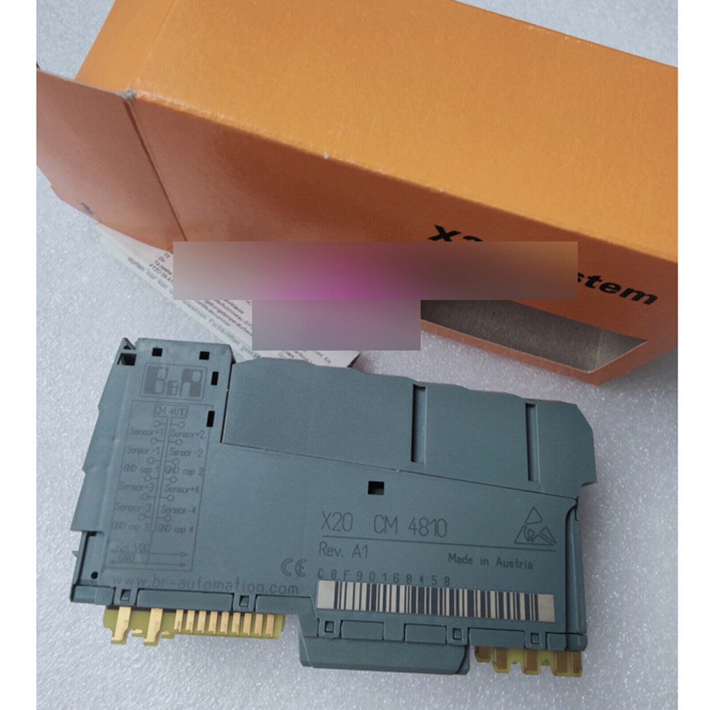 B&R X20 CM 4810 PLC module, new, with product information and Made in Austria label, for industrial automation.