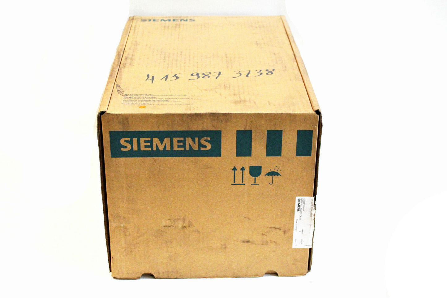 Siemens SIMODRIVE 611 power module box, industrial automation part, cardboard packaging with product information.