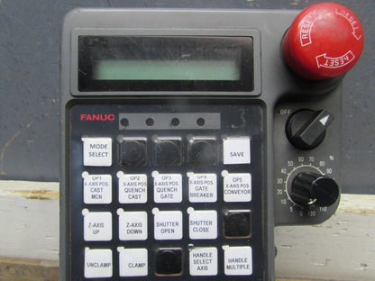 FANUC Teach Pendant with multiple control buttons, red emergency stop, and display screen, industrial automation component