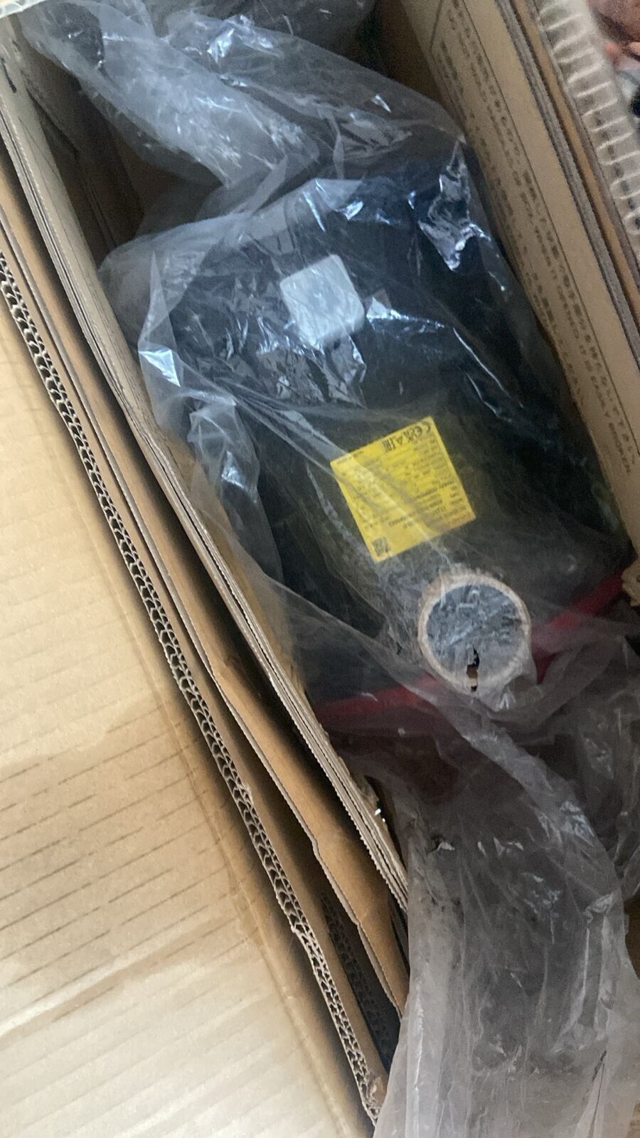 New FANUC A06B-2041-B605#0042 servo motor in cardboard box, plastic wrapped, industrial automation part.