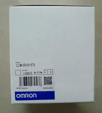 Omron CJ1M-CPU13-ETN PLC Module box, white packaging with product label, Made in Japan.