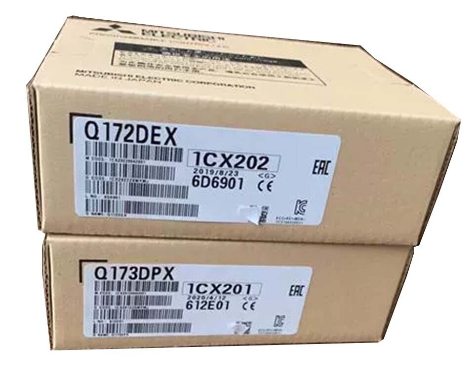 Mitsubishi Q172DEX PLC Module boxes, featuring product codes and labels.