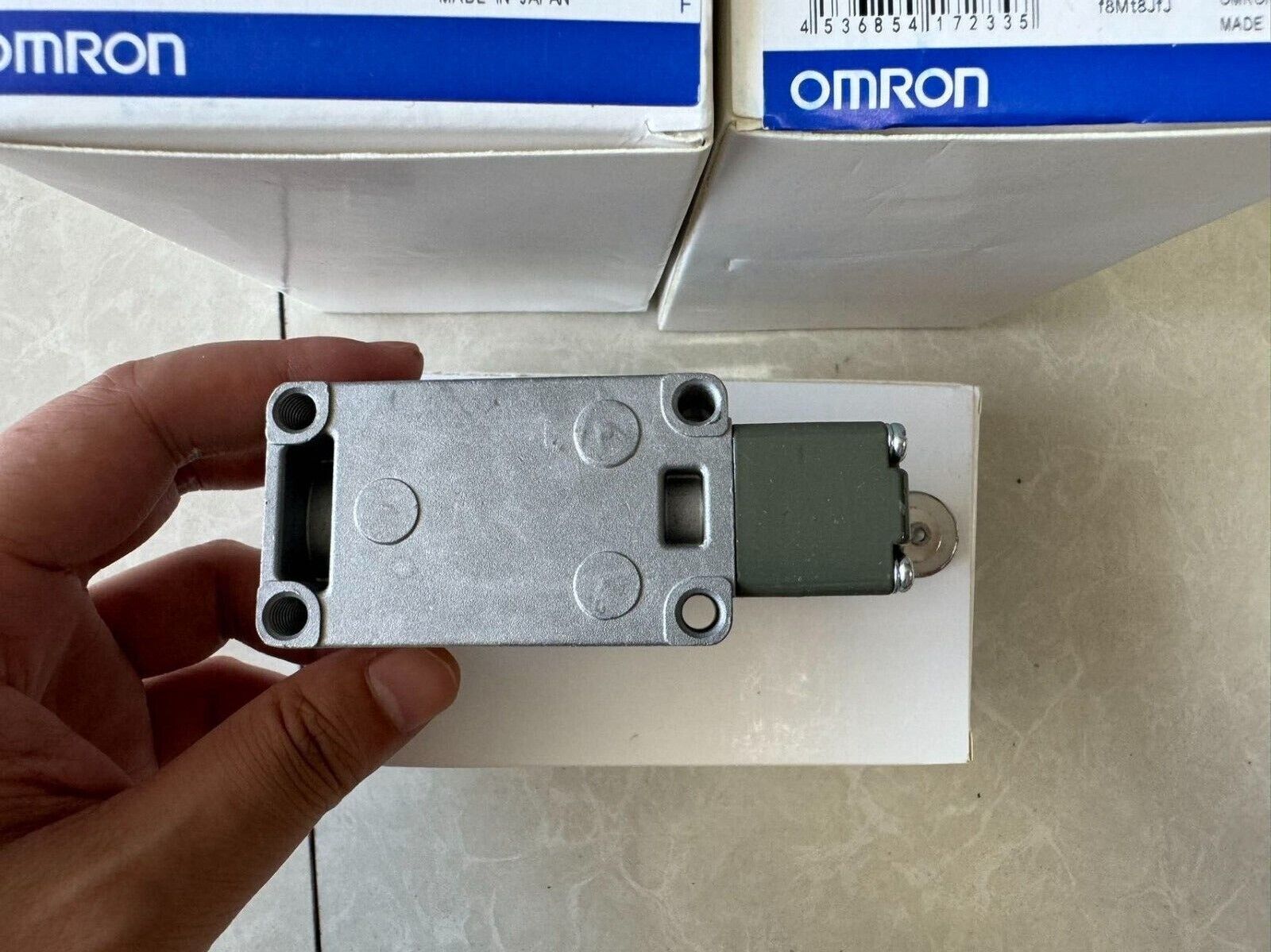 Omron WLCA12-2N limit switch, silver metal housing, industrial automation sensor, new product