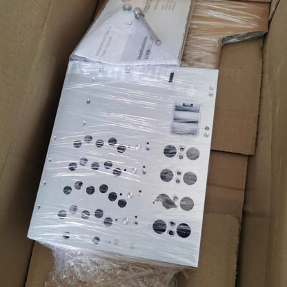 FESTO VABM-L1-14W-G14-12-GR gas circuit board, aluminum, wrapped in plastic, with accompanying paperwork.