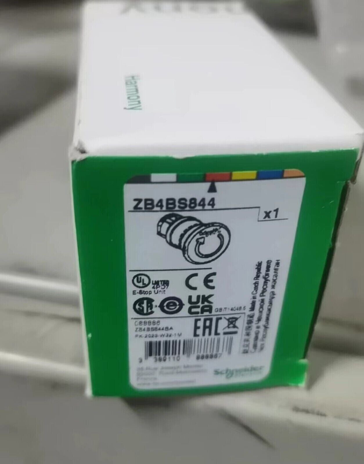Schneider Electric ZB4BS844 E-Stop Unit product packaging, industrial automation part