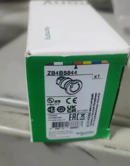 Schneider Electric ZB4BS844 E-Stop Unit product packaging, industrial automation part
