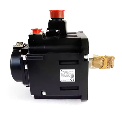 Mitsubishi HG-SR52B Servo Motor. Black industrial automation part with red caps, side view, New.